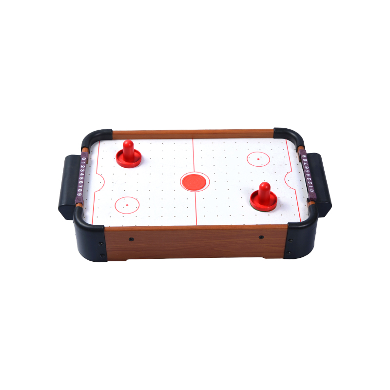 Mini-desktopspel met rode pucks en scoretrackers Compacte houten airhockeytafel